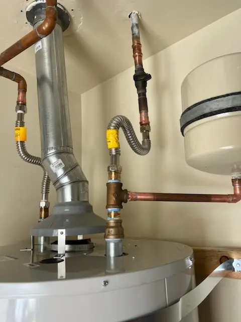 Water heater installation and plumbing repair in Springlake-University Terrace